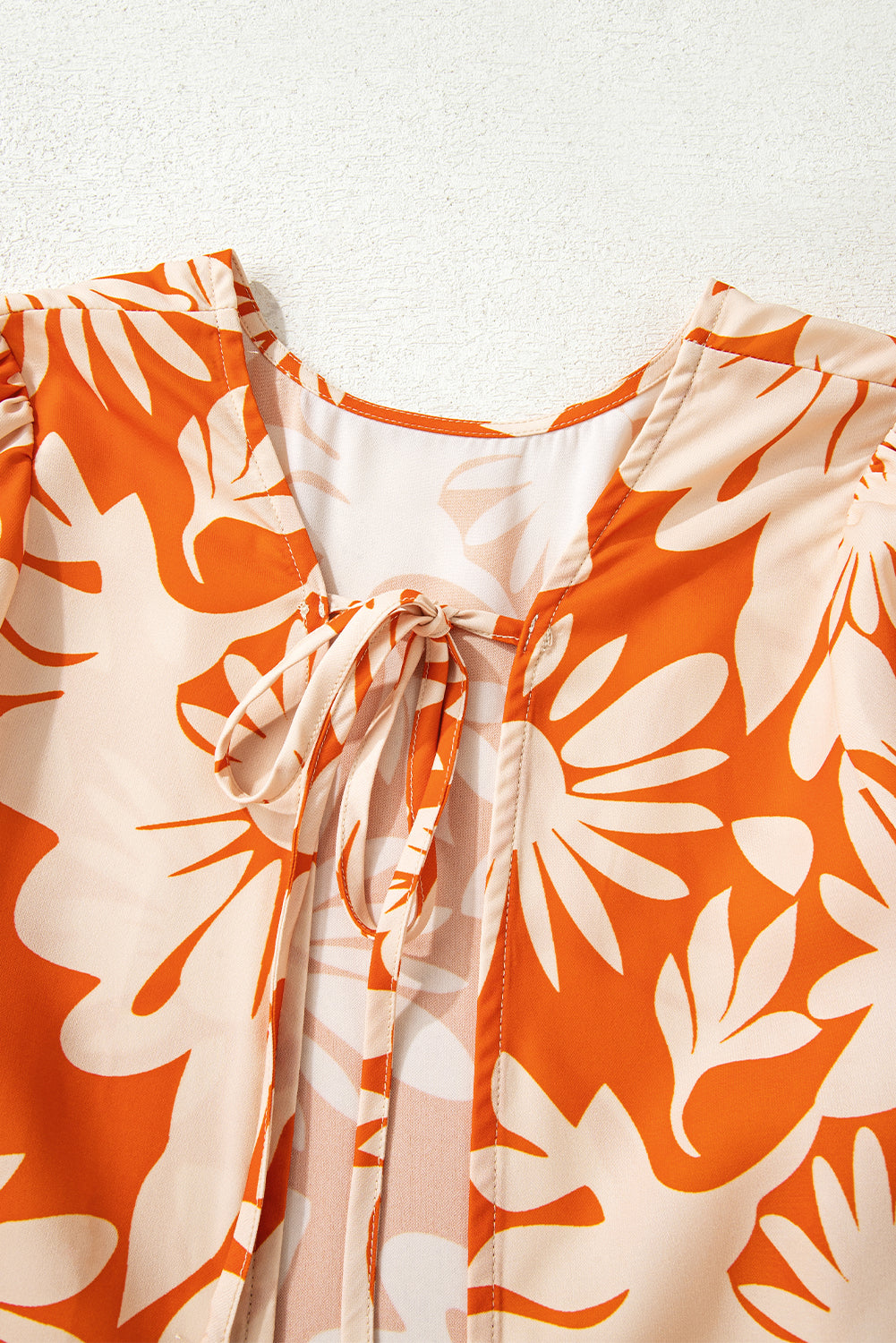 Knotted Open Back Blouse