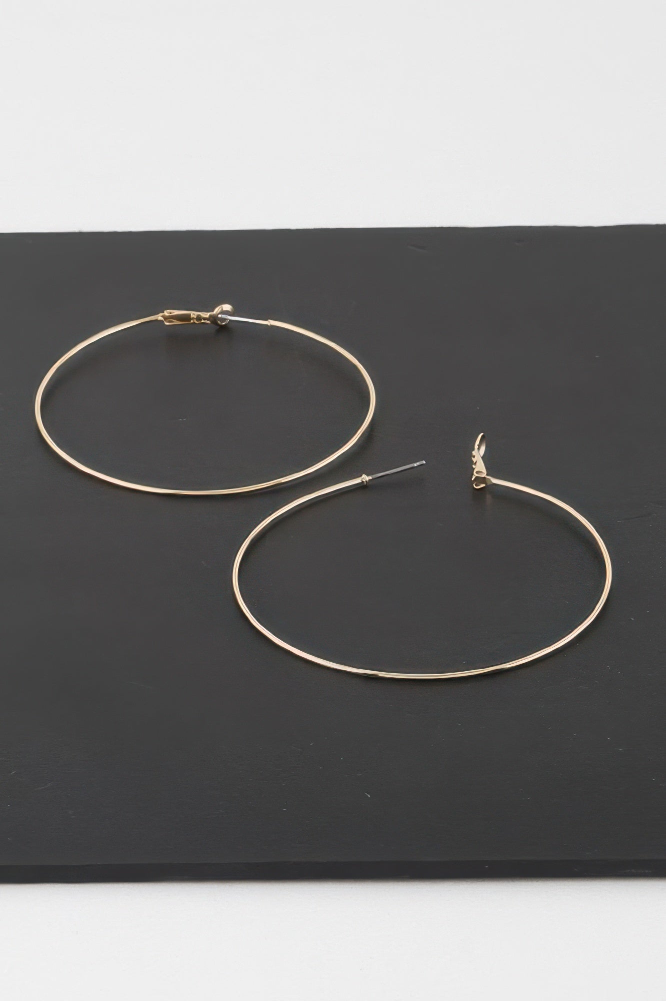 Thin Hoop Earrings in gold and silver