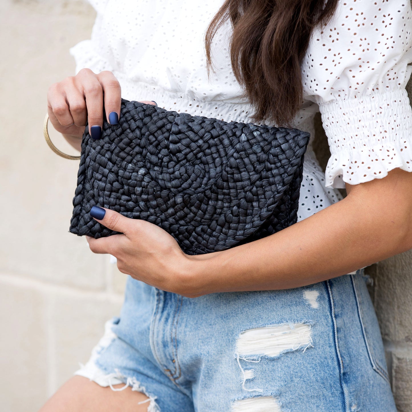 Foldover Straw Clutch in natural and black