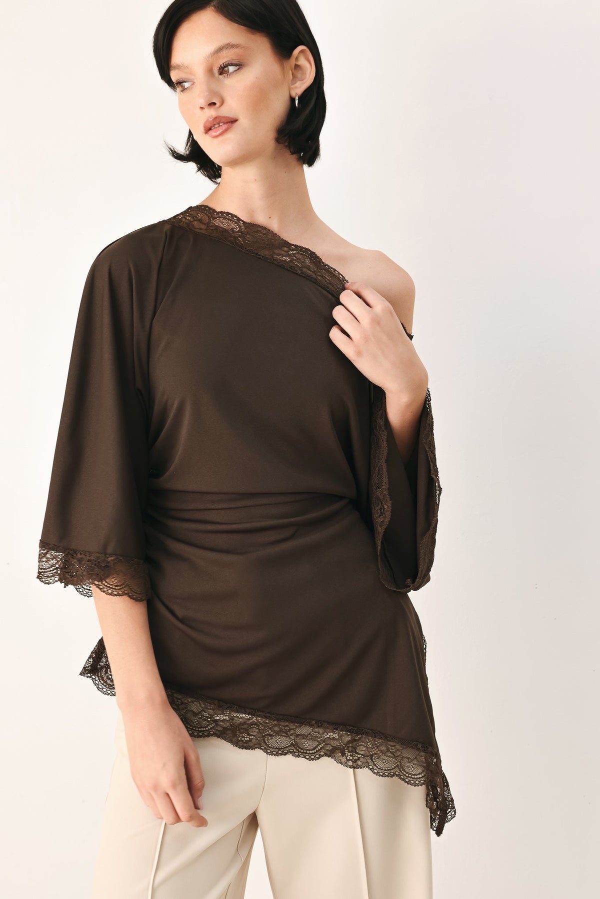 Lace Trim Asymmetrical Blouse in black and brown