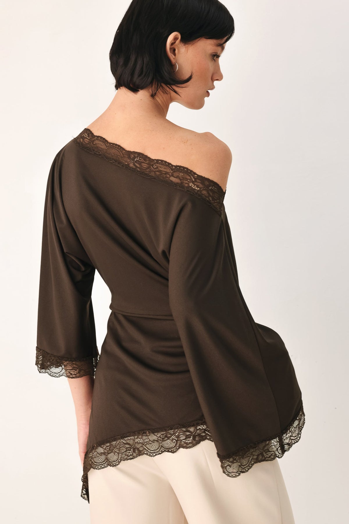 Lace Trim Asymmetrical Blouse in black and brown