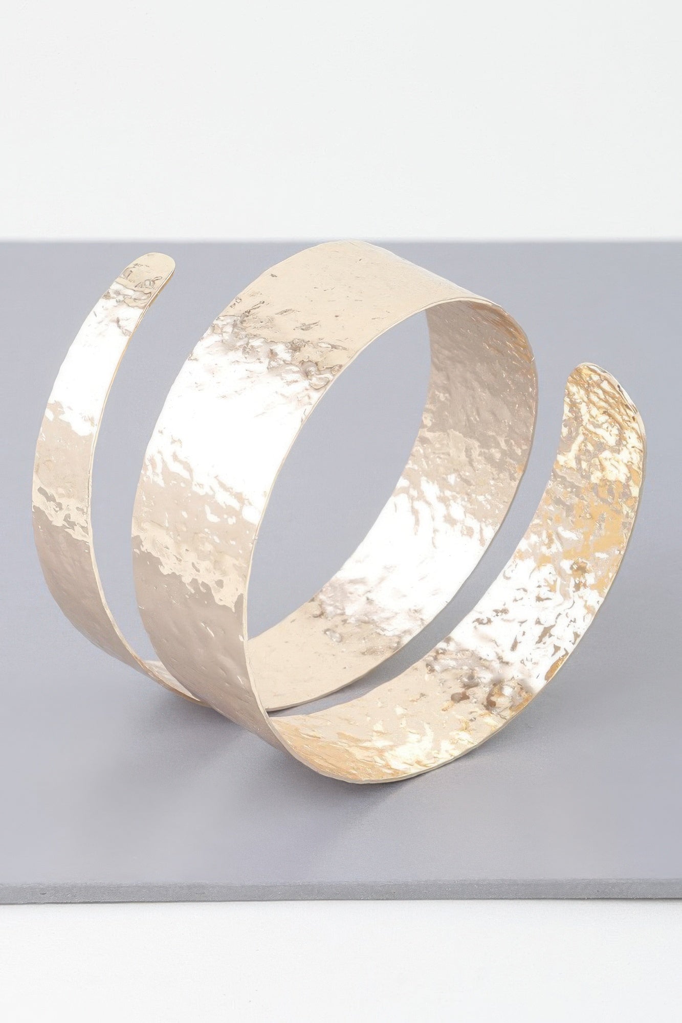 Hammered Wrap Around Cuff in gold and silver