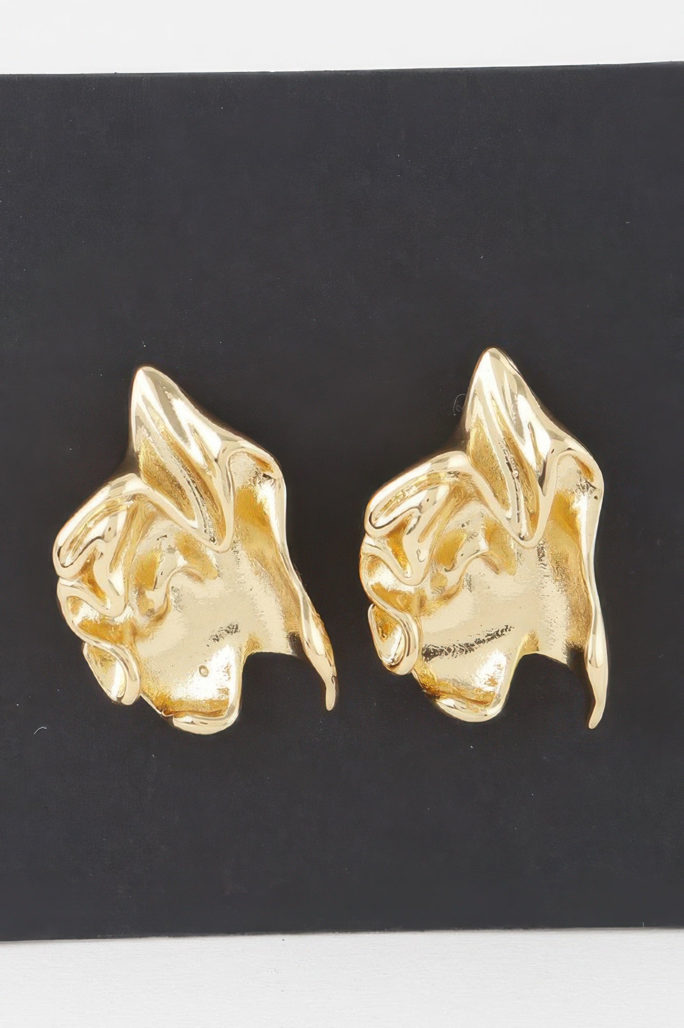 Ripple In Time Earrings in gold and silver