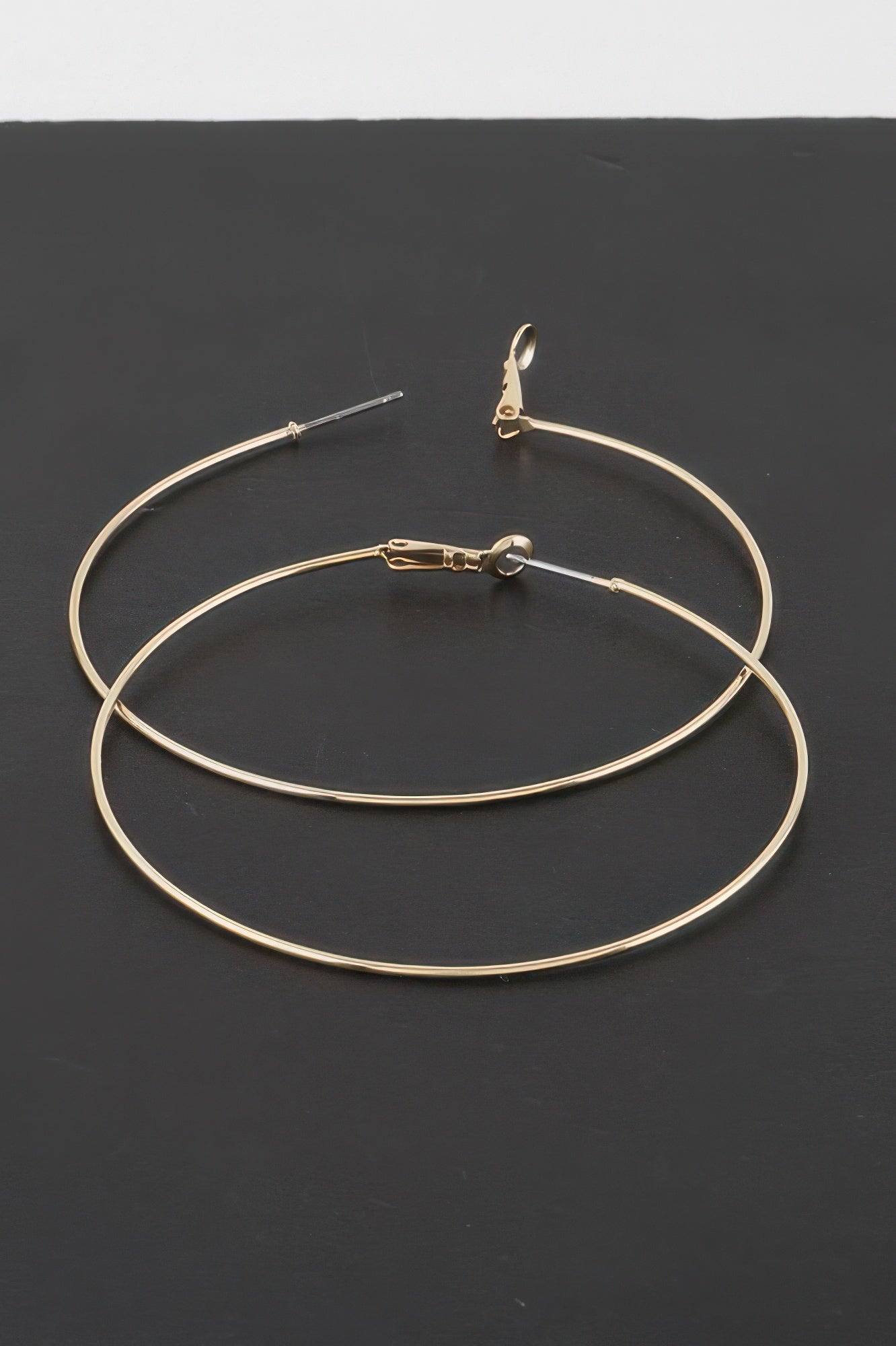 Thin Hoop Earrings in gold and silver