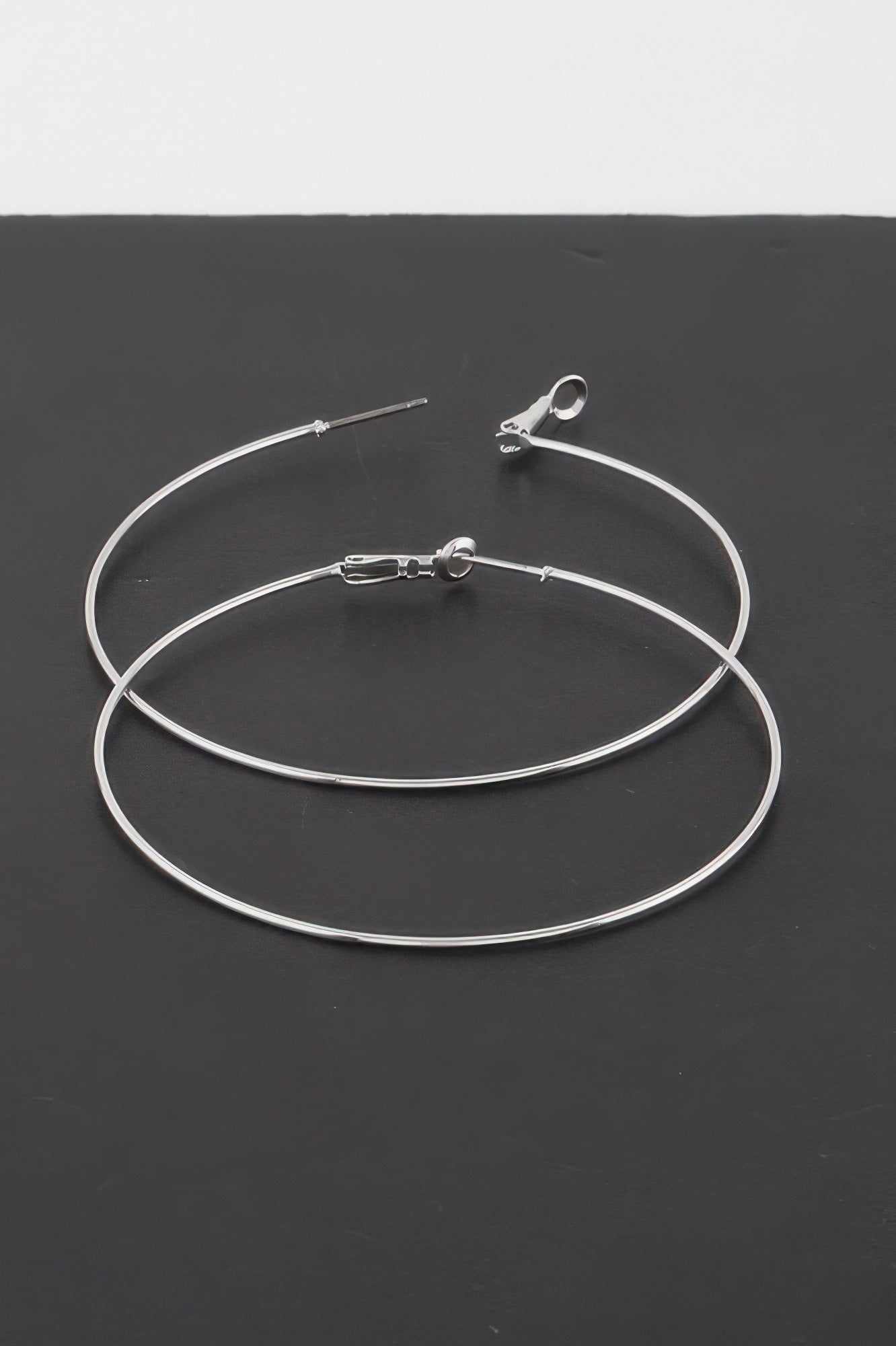 Thin Hoop Earrings in gold and silver